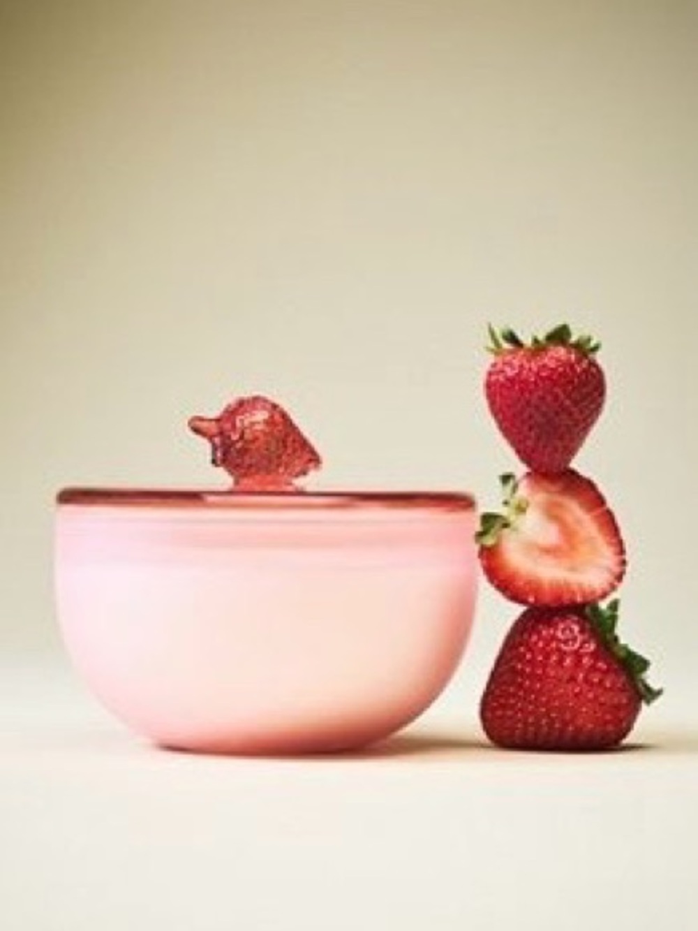 Pink Glass Lidded Strawberry 3 Wick Candle from Anthropologie.